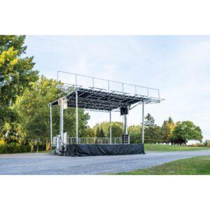 Stageline SL225 mobile stage deployed outdoors with covered roof and open deck